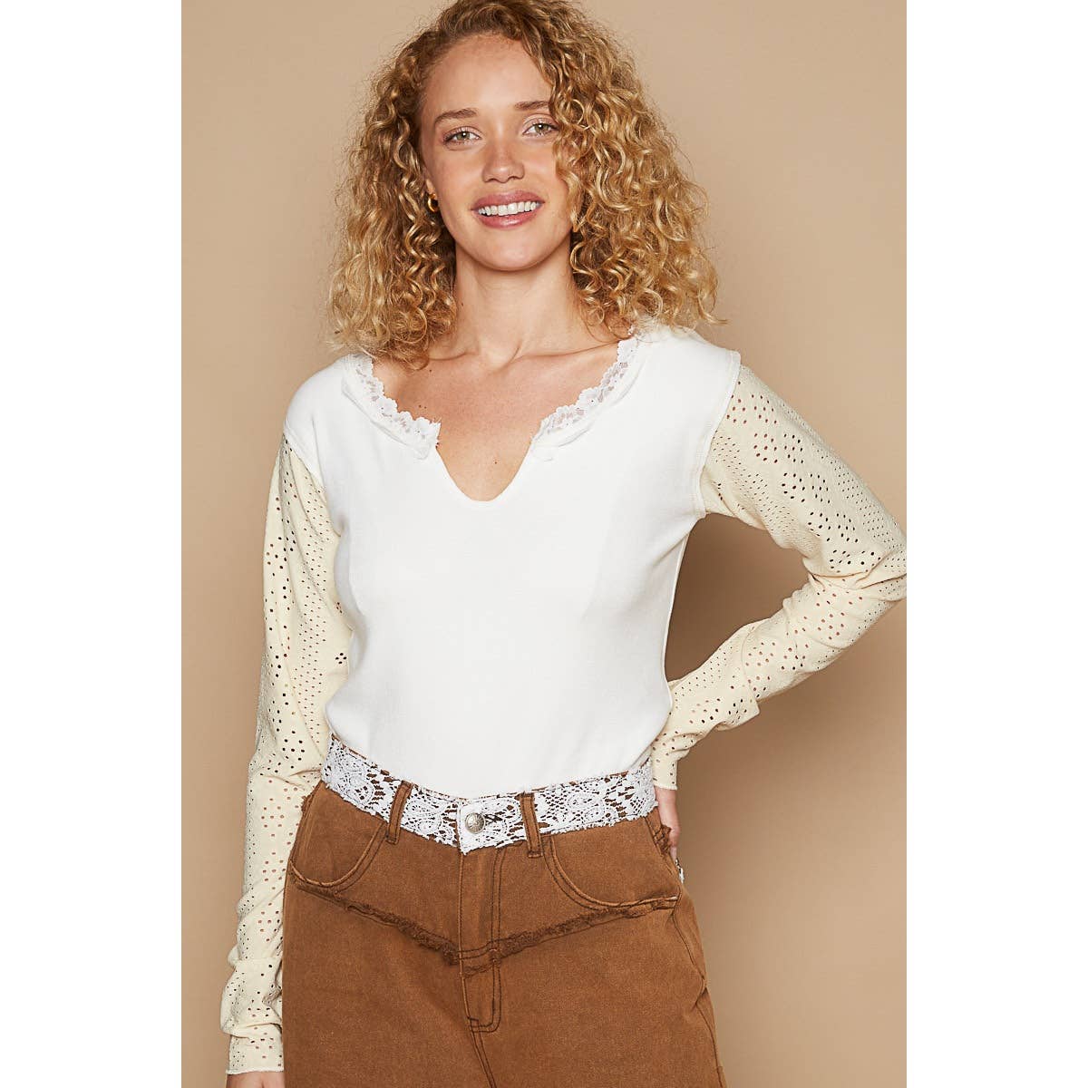 Round neck embroidered long sleeve solid knit top