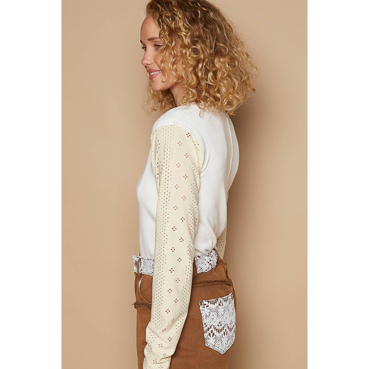 Round neck embroidered long sleeve solid knit top