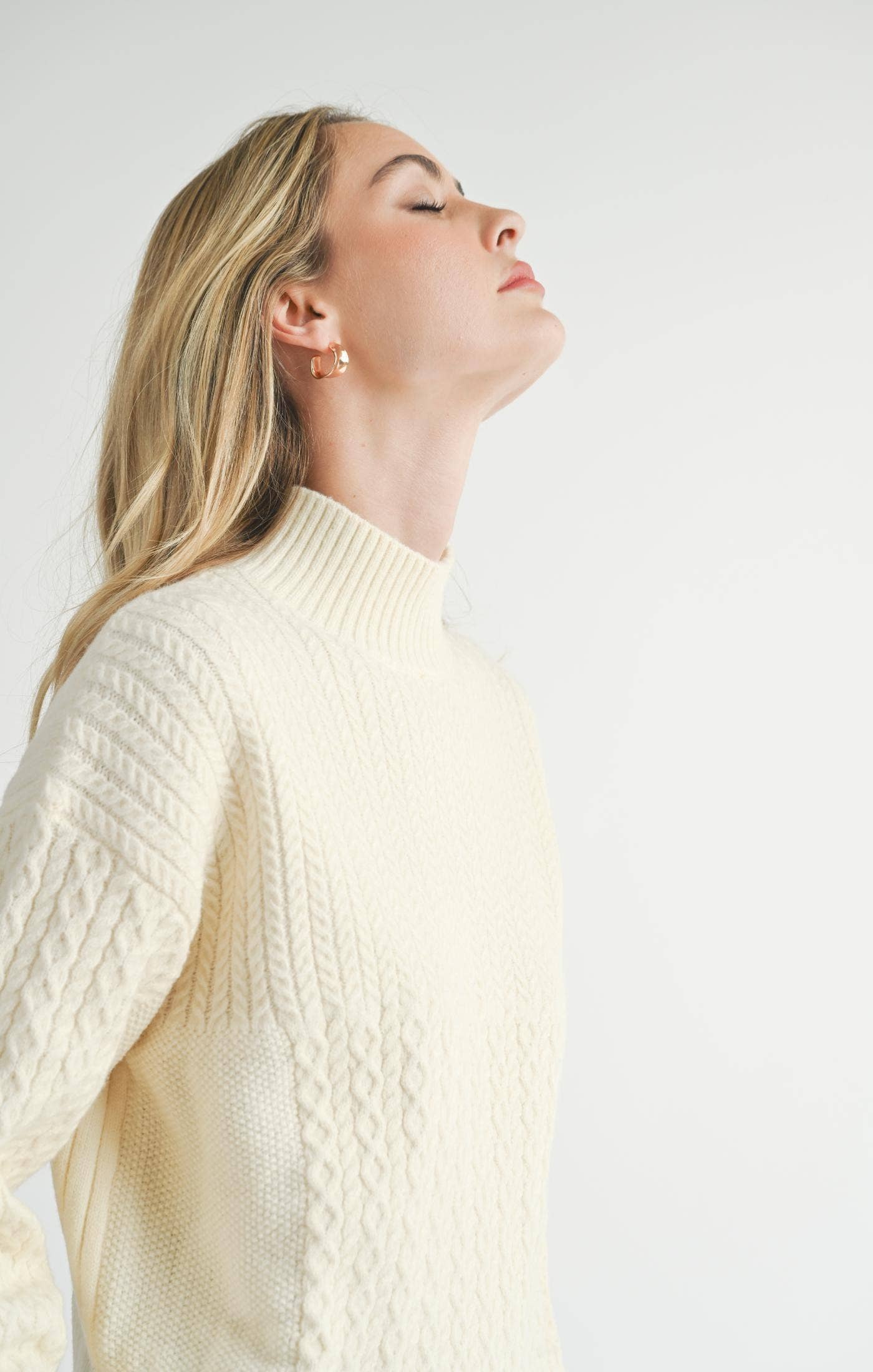 Ivory Turtleneck Sweater