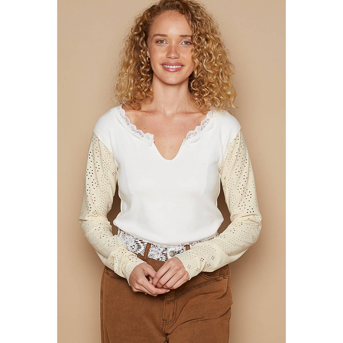 Round neck embroidered long sleeve solid knit top